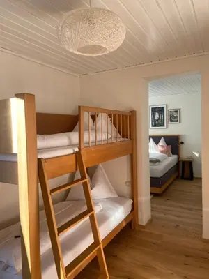 Ein Bett oder Betten in einem Zimmer der Unterkunft Zirbis Bergzauber