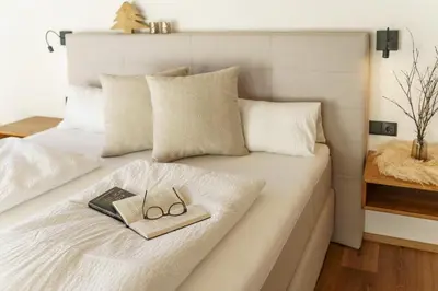Ein Bett oder Betten in einem Zimmer der Unterkunft Schlicki's Bergchalet