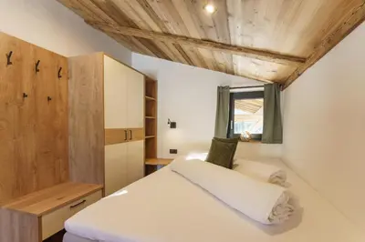 Ein Bett oder Betten in einem Zimmer der Unterkunft Schlicki's Bergchalet