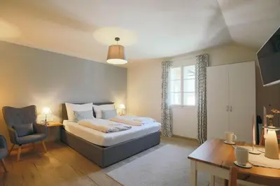 Ein Bett oder Betten in einem Zimmer der Unterkunft Domizil Ausseerland - Your Austrian Home