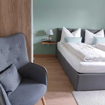 Ein Bett oder Betten in einem Zimmer der Unterkunft Domizil Ausseerland - Your Austrian Home