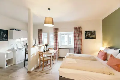 Ein Bett oder Betten in einem Zimmer der Unterkunft Domizil Ausseerland - Your Austrian Home