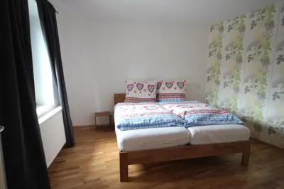 Ein Bett oder Betten in einem Zimmer der Unterkunft Gala Apartments - Country Oasis in Pettenbach