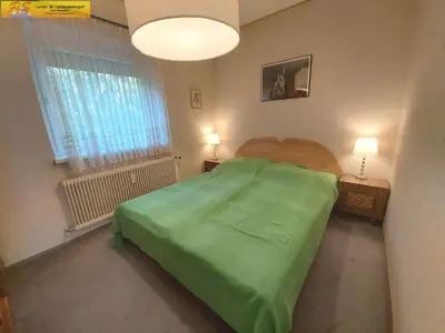 Ein Bett oder Betten in einem Zimmer der Unterkunft Apartment Dominique by FiS - Fun in Styria