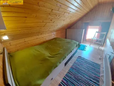 Ein Bett oder Betten in einem Zimmer der Unterkunft Apartment Dominique by FiS - Fun in Styria