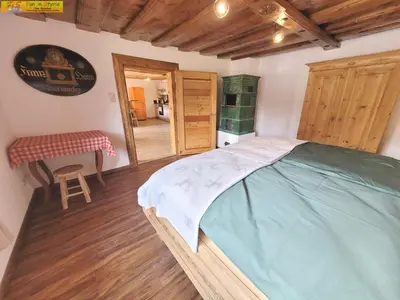 Ein Bett oder Betten in einem Zimmer der Unterkunft Apartment Klampfner by FiS - Fun in Styria