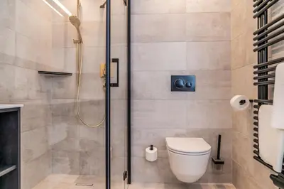 Ein Badezimmer in der Unterkunft Chalets Almadel by Schladmingurlaub