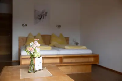 Ein Bett oder Betten in einem Zimmer der Unterkunft Urlaub am Dichtlhof