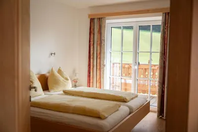 Ein Bett oder Betten in einem Zimmer der Unterkunft Urlaub am Dichtlhof