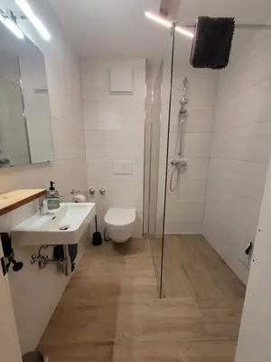 Ein Badezimmer in der Unterkunft Apartmenthaus Edelweiss in Gosau