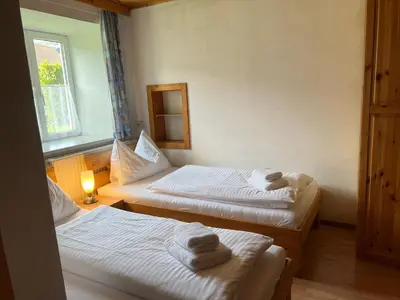 Ein Bett oder Betten in einem Zimmer der Unterkunft Haus Peter