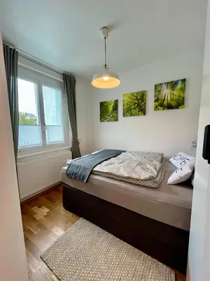 Ein Bett oder Betten in einem Zimmer der Unterkunft Wohnung in Gmunden Wochen und Monatsweise