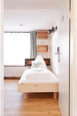 Ein Bett oder Betten in einem Zimmer der Unterkunft Gästehaus Zeitraum