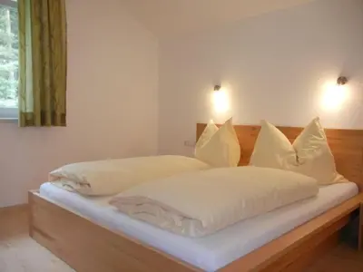 Ein Bett oder Betten in einem Zimmer der Unterkunft Haus Terra Comfortable holiday residence