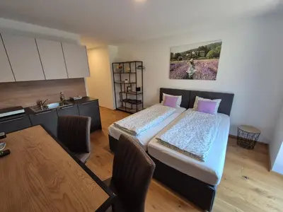 Ein Bett oder Betten in einem Zimmer der Unterkunft RITTERTAL Altmünster Traunsee Apartment