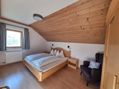Ein Bett oder Betten in einem Zimmer der Unterkunft Schüttbachhof Appartements