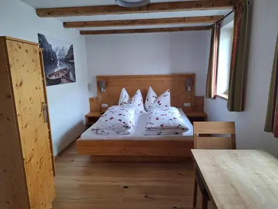 Ein Bett oder Betten in einem Zimmer der Unterkunft Schüttbachhof Appartements