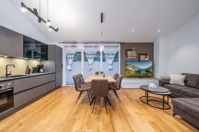 Küche/Küchenzeile in der Unterkunft GardenAlpin & PanoramaAlpin Apartments - by myNests