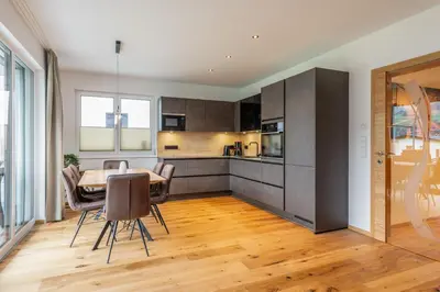 Küche/Küchenzeile in der Unterkunft GardenAlpin & PanoramaAlpin Apartments - by myNests