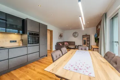 Küche/Küchenzeile in der Unterkunft GardenAlpin & PanoramaAlpin Apartments - by myNests