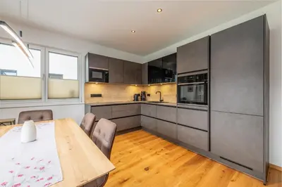 Küche/Küchenzeile in der Unterkunft GardenAlpin & PanoramaAlpin Apartments - by myNests