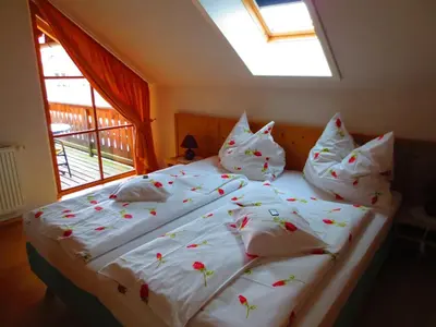 Ein Bett oder Betten in einem Zimmer der Unterkunft Sportlerhof