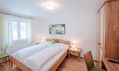 Ein Bett oder Betten in einem Zimmer der Unterkunft Haus Kirchgasser