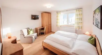 Ein Bett oder Betten in einem Zimmer der Unterkunft Haus Kirchgasser