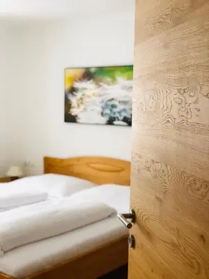 Ein Bett oder Betten in einem Zimmer der Unterkunft Haus Kirchgasser
