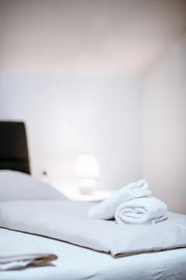 Ein Bett oder Betten in einem Zimmer der Unterkunft Apartment Ferienwohnung Grimmingblick by Interhome