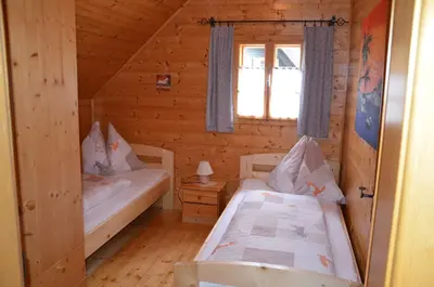 Ein Bett oder Betten in einem Zimmer der Unterkunft Ferienhaus Anna