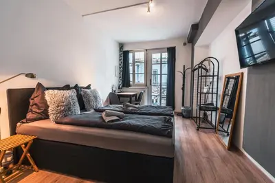 Ein Bett oder Betten in einem Zimmer der Unterkunft Im Herzen von Bad Ischl #1