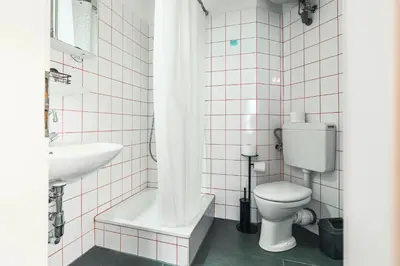 Ein Badezimmer in der Unterkunft Im Herzen von Bad Ischl #1