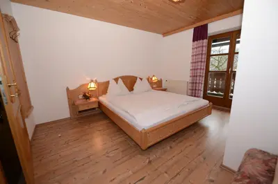 Ein Bett oder Betten in einem Zimmer der Unterkunft Weinbachbauer - Urlaub am Bauernhof