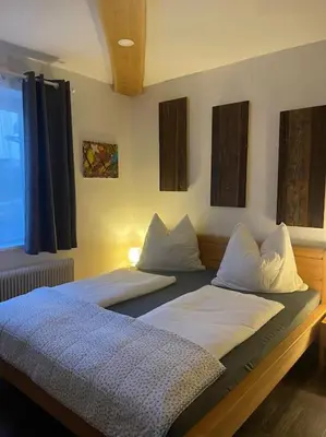 Ein Bett oder Betten in einem Zimmer der Unterkunft Ferienwohnung Ortner am Kreischberg