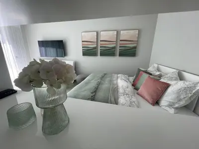 Ein Bett oder Betten in einem Zimmer der Unterkunft Eva's Appartement