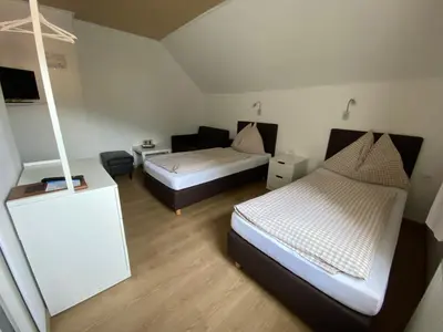 Ein Bett oder Betten in einem Zimmer der Unterkunft Pension Eder