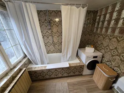 Ein Badezimmer in der Unterkunft Haus Bellaflora Apartman