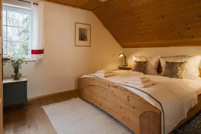 Ein Bett oder Betten in einem Zimmer der Unterkunft Das Heinz - Your Austrian Home