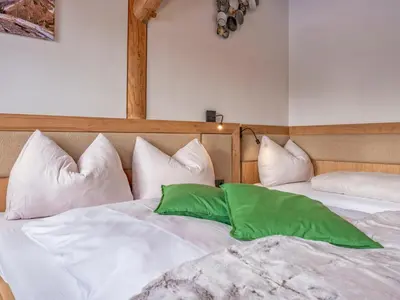 Ein Bett oder Betten in einem Zimmer der Unterkunft Deluxe Zirberl Top 5