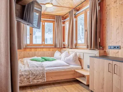 Ein Bett oder Betten in einem Zimmer der Unterkunft Deluxe Zirberl Top 1