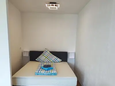 Ein Bett oder Betten in einem Zimmer der Unterkunft Ferienwohnung - Apartment Pichlarn Holiday Grimmingblick