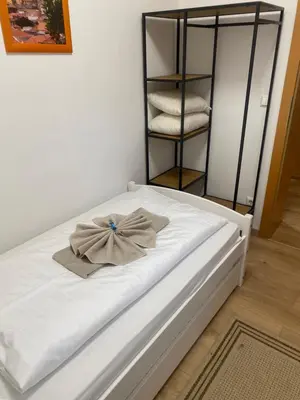 Ein Bett oder Betten in einem Zimmer der Unterkunft Apartment DOLCE VITA