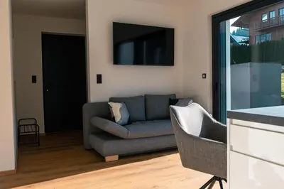 Ein Sitzbereich in der Unterkunft Appartement Herzmoar