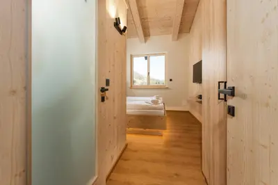 Ein Bett oder Betten in einem Zimmer der Unterkunft Chalets te Best by Schladming-Appartements