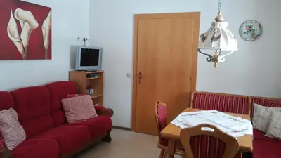Ein Sitzbereich in der Unterkunft Apartment Knablhof