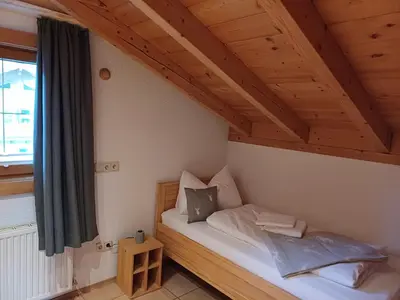 Ein Bett oder Betten in einem Zimmer der Unterkunft Appartement Zürcher