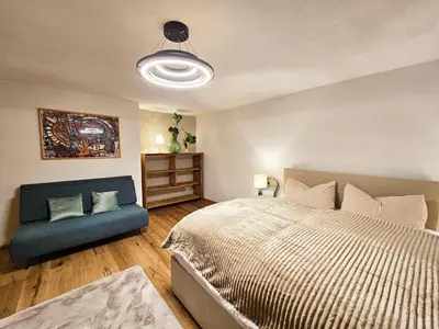 Ein Bett oder Betten in einem Zimmer der Unterkunft Marianne - Alpine Apartments