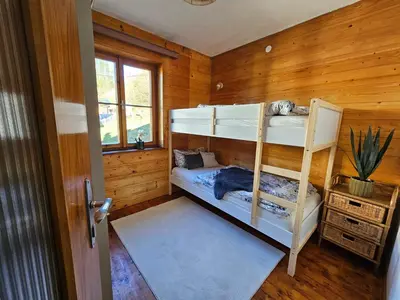 Ein Bett oder Betten in einem Zimmer der Unterkunft Marianne - Alpine Apartments