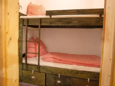 Ein Bett oder Betten in einem Zimmer der Unterkunft Apartment Dachstein Top 12 by Interhome